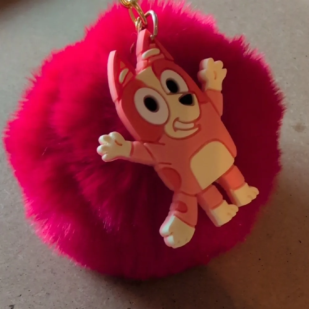 Vibrant Red Fluffy Keychain with Cartoon Charm